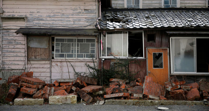 東日本大震災で崩壊された家